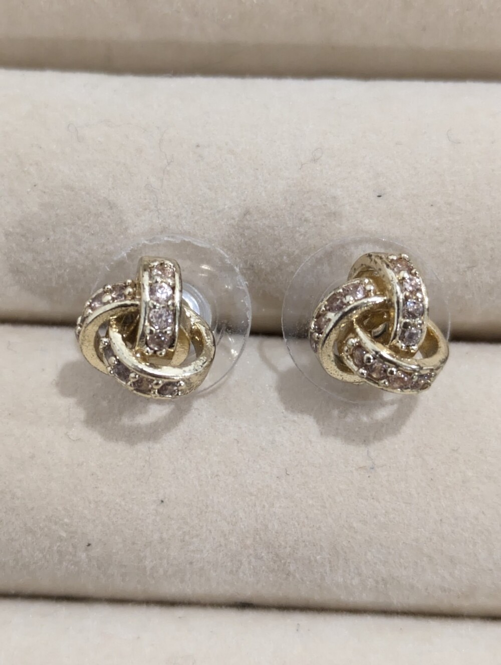 Triple interlocked knot design earrings